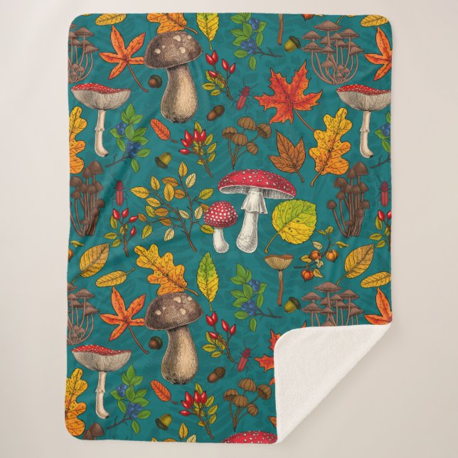 Autumn mushrooms, leaves, nuts and berries on blue sherpa blanket (Front)