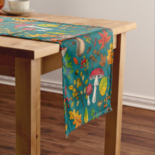 Autumn mushrooms, leaves, nuts and berries on blue short table runner