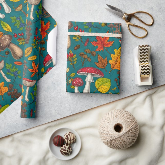 Autumn mushrooms, leaves, nuts and berries on blue wrapping paper (Crafts)