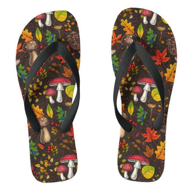 Autumn mushrooms, leaves, nuts and berries on dark flip flops (Footbed)
