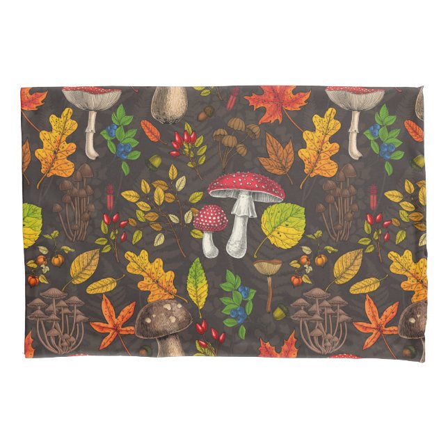 Autumn mushrooms, leaves, nuts and berries on dark pillow case (Front-Left)