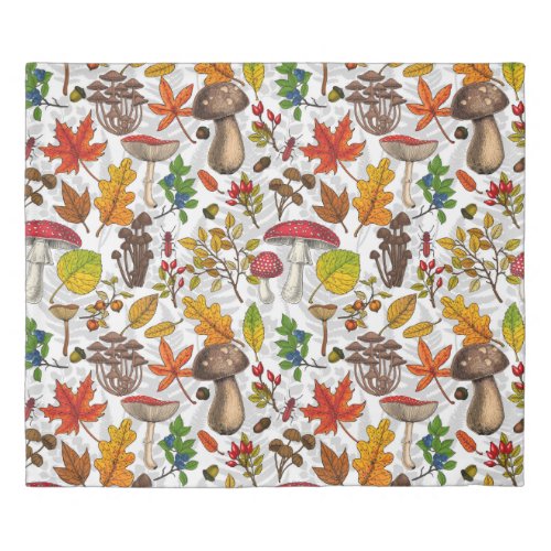 Autumn mushrooms leaves nuts and berries on whit duvet cover