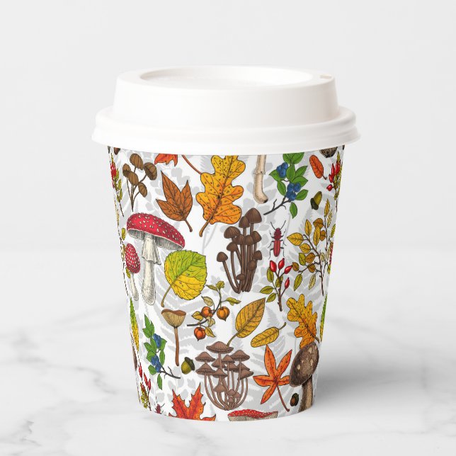 Autumn mushrooms, leaves, nuts and berries on whit paper cups (Front)