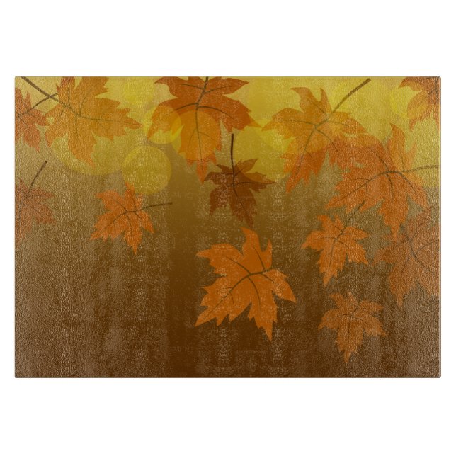 Autumn pattern with falling maple leaves and bokeh cutting board (Front)