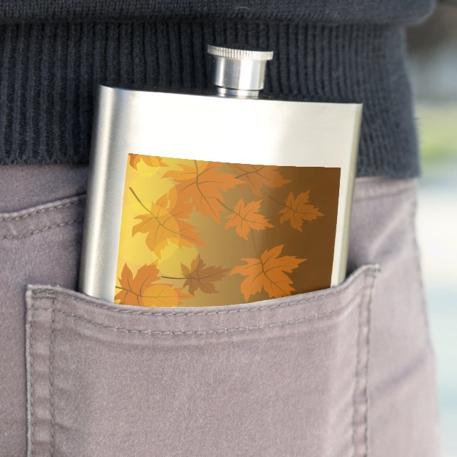 Autumn pattern with falling maple leaves and bokeh flask (In Situ)
