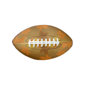 Autumn pattern with falling maple leaves and bokeh football