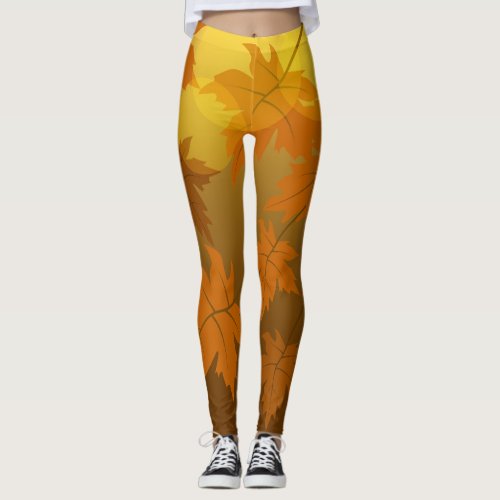 Autumn pattern with falling maple leaves and bokeh leggings