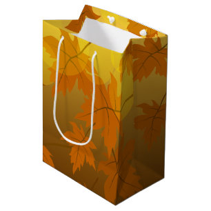 Autumn pattern with falling maple leaves and bokeh medium gift bag