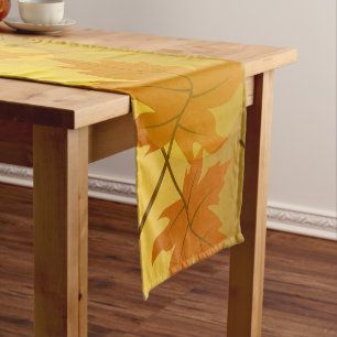 Autumn pattern with falling maple leaves and bokeh short table runner