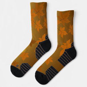 Autumn pattern with falling maple leaves and bokeh socks