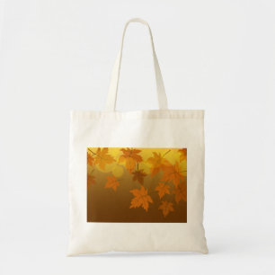 Autumn pattern with falling maple leaves and bokeh tote bag