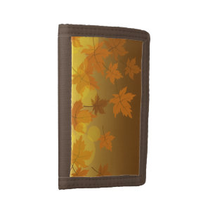 Autumn pattern with falling maple leaves and bokeh tri-fold wallet
