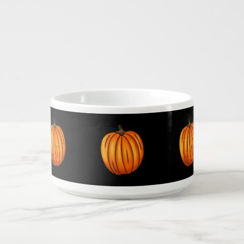 Autumn pumpkins on black bowl