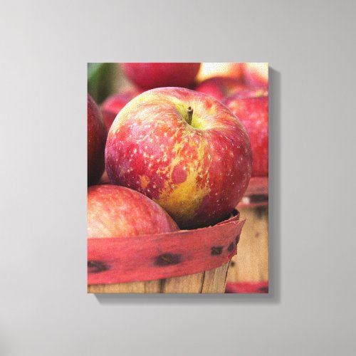 Autumn red apples in basket canvas print