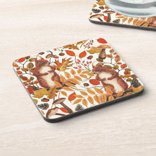 Autumn squirrels and autumnal flora on off white beverage coaster (Left Side)