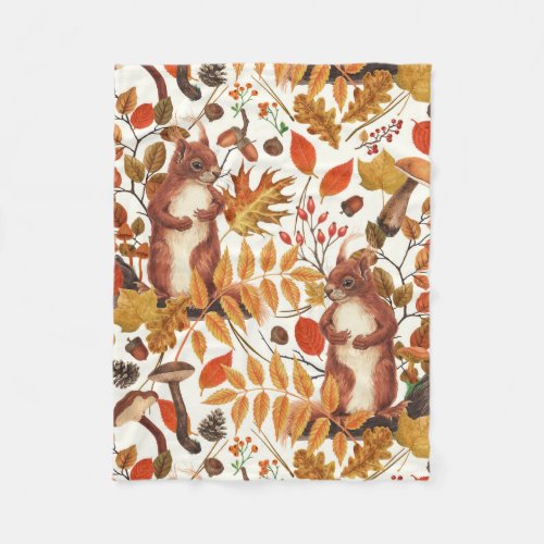 Autumn squirrels and autumnal flora on off white fleece blanket