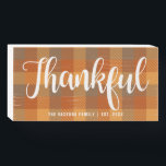 Autumn Tartan Plaid Thankful Personalized Wooden Box Sign<br><div class="desc">Decor your home or gift for someone special. This sign features a tartan plaid pattern of fall colors in orange,  yellow,  and brown with script "thankful" in white with family in modern typography. Message me if you need assistance or have any special requests.</div>