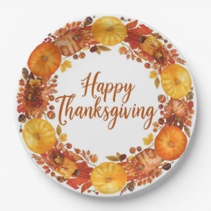 Autumn themed thanksgiving with flowers pumpkins paper plates