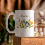 Autumn Watercolor Pumpkins Coffee Mug<br><div class="desc">Beautiful watercolor pumpkins in shades of blue,  green,  orange,  and white are featured on this seasonal mug. You can customize the word Autumn that is on both sides of the mug. Delight your guests and family for fall and Thanksgiving with this watercolor pumpkin mug.</div>