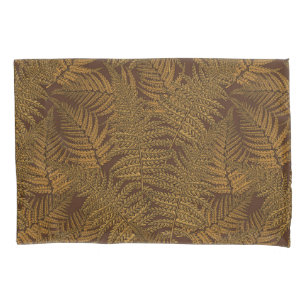 Autumnal fern on brown pillow case