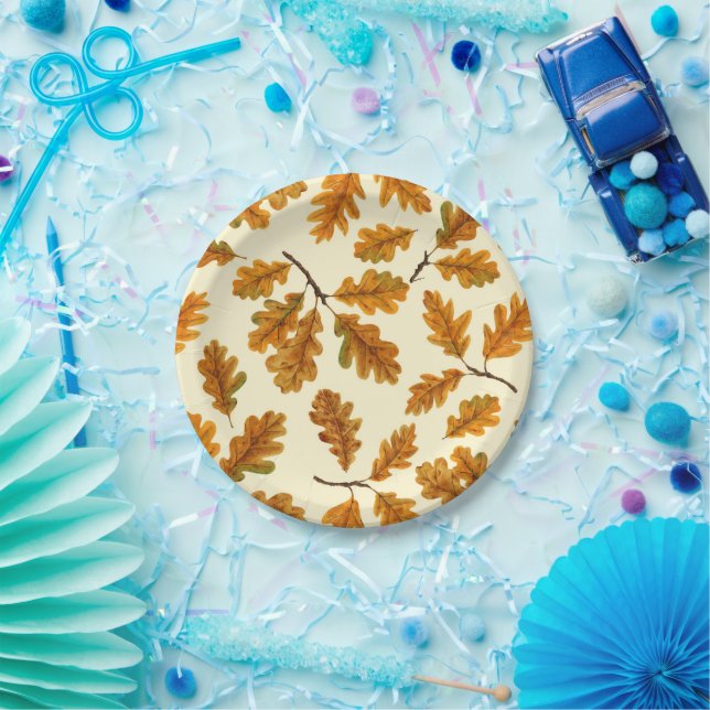 Autumnal oak leaves on off white paper plates (Party)