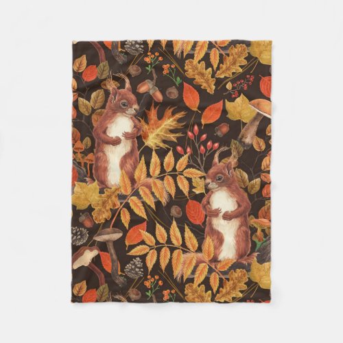 Autumnal squirrels and flora on dark brown fleece blanket