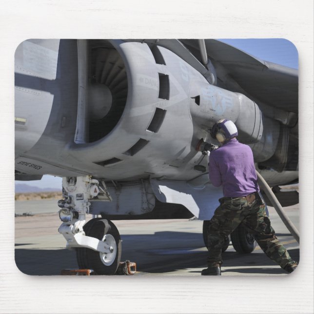 Aviation fuel technician attaches a fuel line mouse pad (Front)