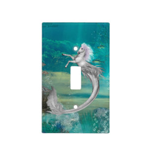 Awesome seahorse in the deep ocean light switch cover