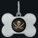 Aztec Gold Skull & Cutlass Pirate Calico Jack Pet ID Tag<br><div class="desc">A low growl rumbled across the waves, not from the storm brewing on the horizon, but from Captain Jack's throat. His dark eyes, usually gleaming with mischief, held a steely glint as he surveyed the approaching ship. The "Revenge, " his sloop, heeled slightly in the choppy water, its black hull...</div>