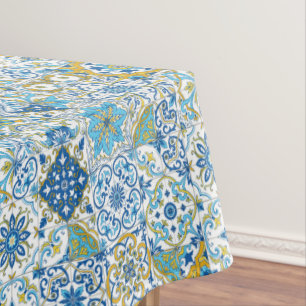 Azulejo tiles in blue and yellow tablecloth