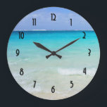 Azure Blue Caribbean Tropical Beach Large Clock<br><div class="desc">A white sandy beach with gentle waves and a vivid ocean view of crystal clear turquoise waters. Bright blue  sky and soft fluffy clouds overlook this dreamy tropical caribbean vacation spot. Tranquil and secluded,  the perfect spot to relax and unwind.</div>