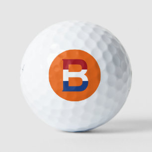 B Monogram overlaid on NLD Flag on or be6 gbcnt Golf Balls
