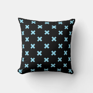 Baby blue cross stitches on black throw pillow