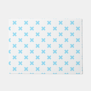 Baby blue cross stitches on white doormat