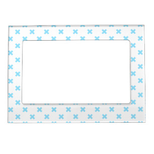 Baby blue cross stitches on white magnetic frame