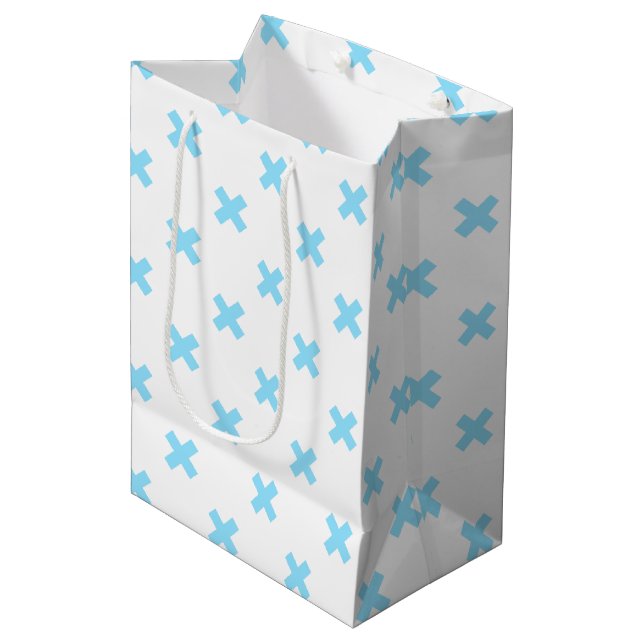 Baby blue cross stitches on white medium gift bag (Front Angled)