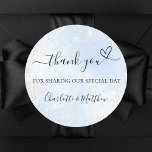 Baby blue silver heart thank you wedding classic round sticker<br><div class="desc">A light blue sky as background,  decorated with faux silver glitter.  With the text: Thank you for sharing our special day,  with a small heart.   Personalize and add your names.</div>