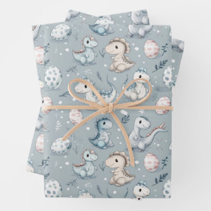 Baby dinosaurs on blue wrapping paper sheets
