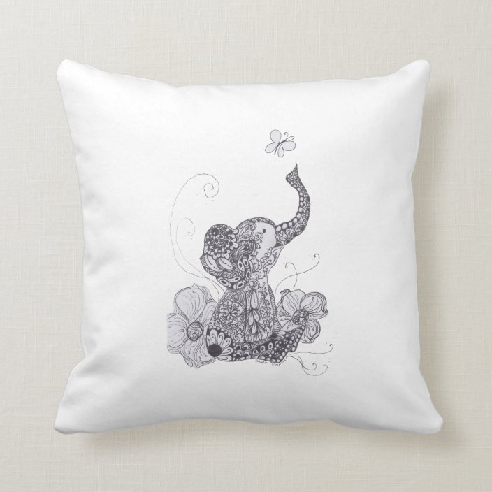 baby on elephant pillow