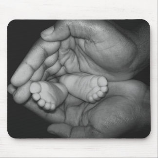 baby feet in father's hands mouse pad
