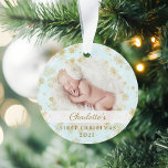 Baby First Christmas Magical Gold Snowflakes Photo Ornament<br><div class="desc">Magical gold snowflake border baby's first Christmas photo keepsake ornament. Gold and light blue baby's first Christmas keepsake ornament can be customized with the baby's name,  the year,  and one photo on the front and one on the back.</div>
