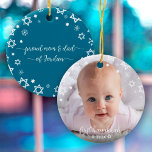 Baby First Hanukkah Stars Snowflakes New Parents Ceramic Ornament<br><div class="desc">“First Hanukkah.” A playful visual of white Stars of David, snowflakes and handwritten script typography with customized year, overlaying the photo of your choice, help you usher in Hanukkah and New Year. On the back, additional white Stars of David, snowflakes and handwritten typography with “proud mom & dad of baby’s...</div>