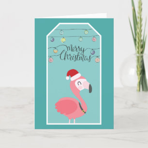 Baby flamingo with santa hat and christmas lights holiday card