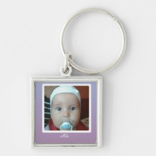 baby girl with big eyes keychain