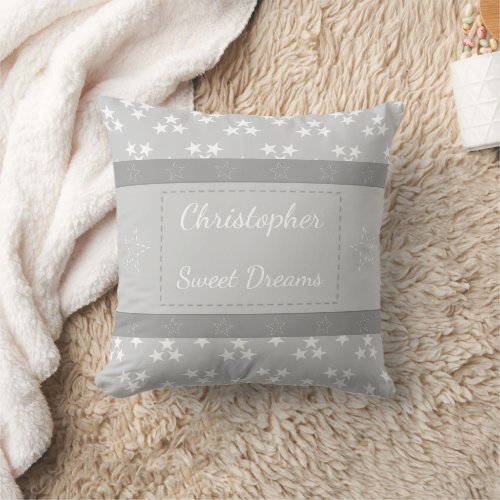 Baby gray and white with stars and a name throw pillow