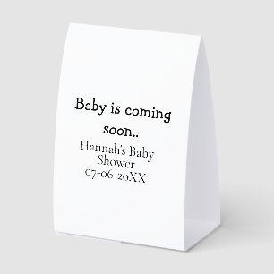 Baby is coming soon baby shower name date typewrit paper table tent