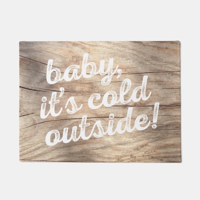 baby, it's cold outside! on light wood background doormat (Front)