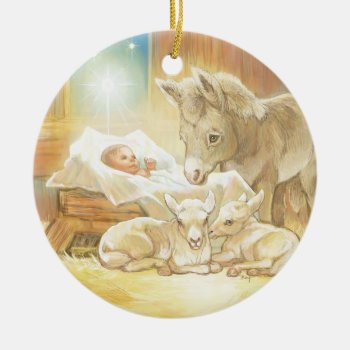 Baby Jesus Nativity With Lambs And Donkey Ceramic Ornament by gingerbreadwishes at Zazzle