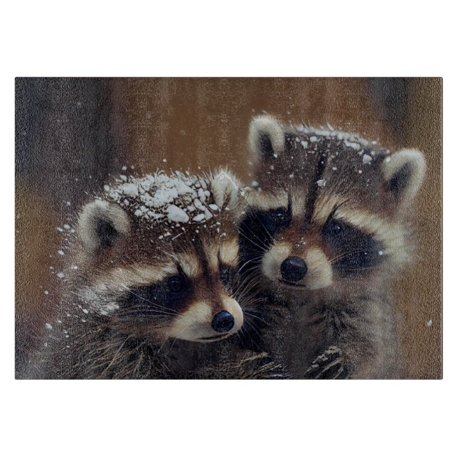 Baby Raccoons Huddle in Falling Snow Glass Cutting Board (Front)