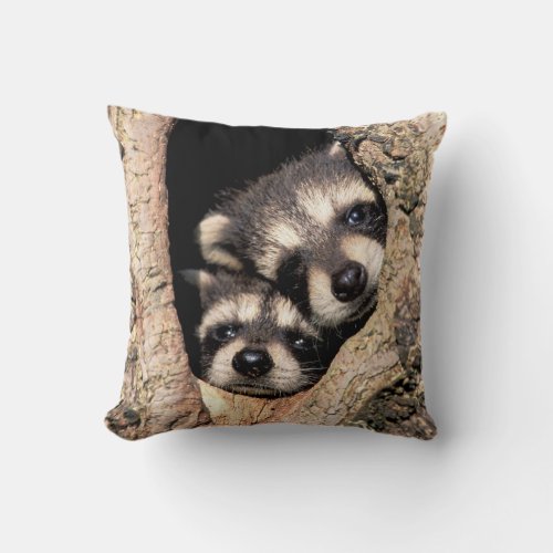 Baby Raccoons Peeking out of Tree Throw Pillow